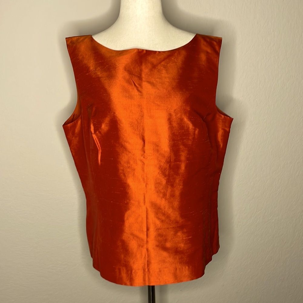 BETU silk shell in a coral/pumpkin orange
